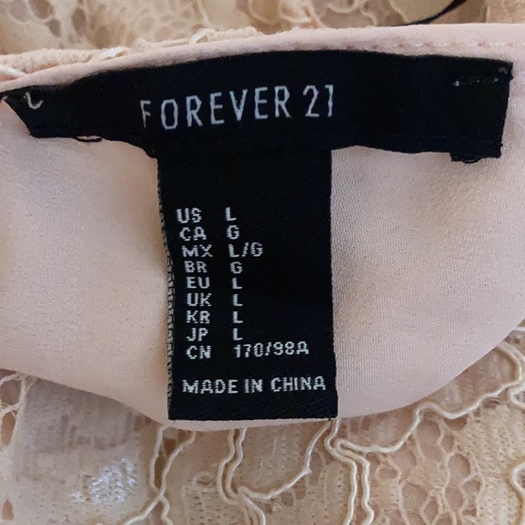 Forever 21 creamy / peachy dress with V neckline and low cut V back. Size Large - Picture 4 of 14